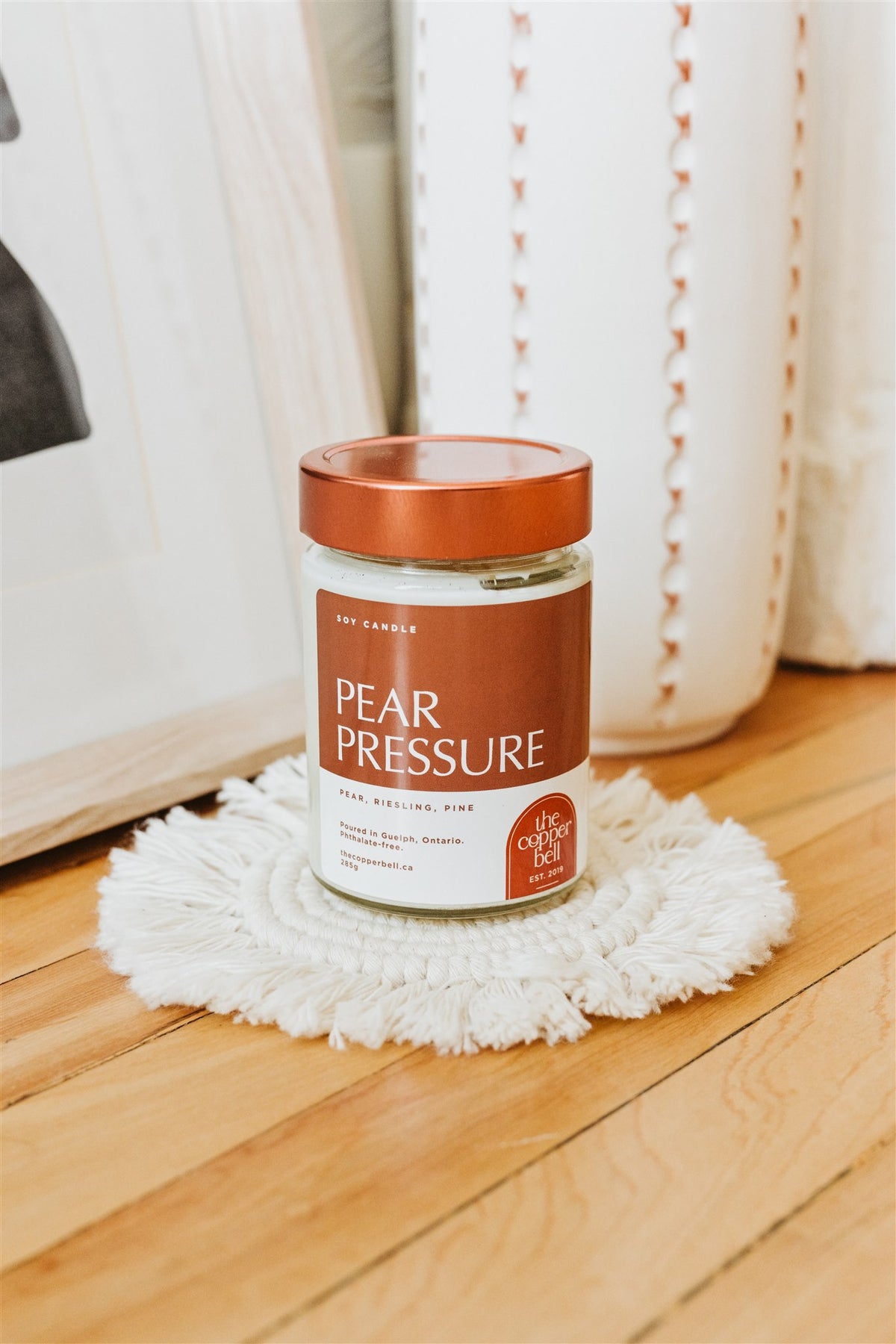 pear pressure is a funny fall candle made by the copper bell