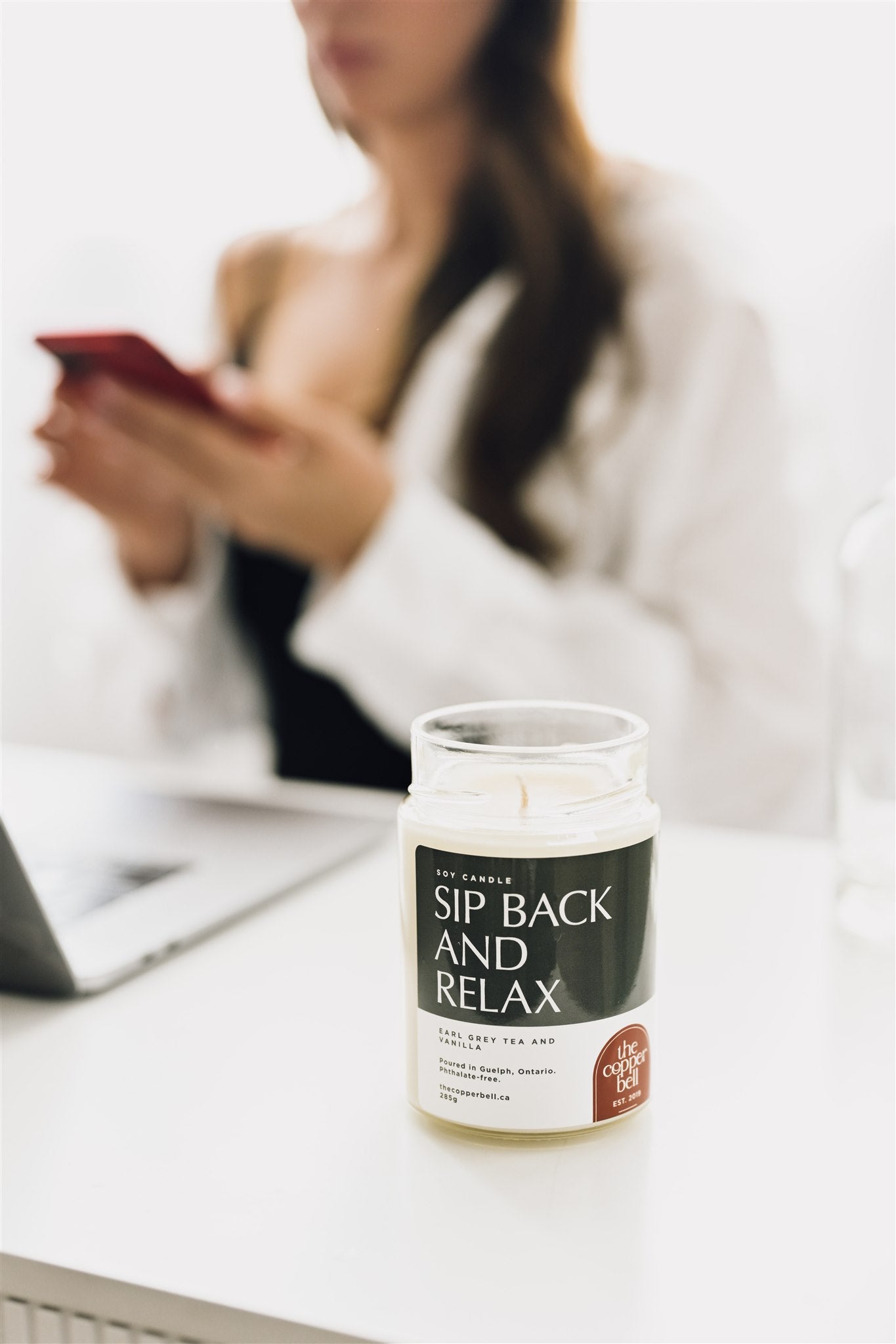 sip back and relax and enjoy this smooth pot of tea. scented candle made by the copper bell