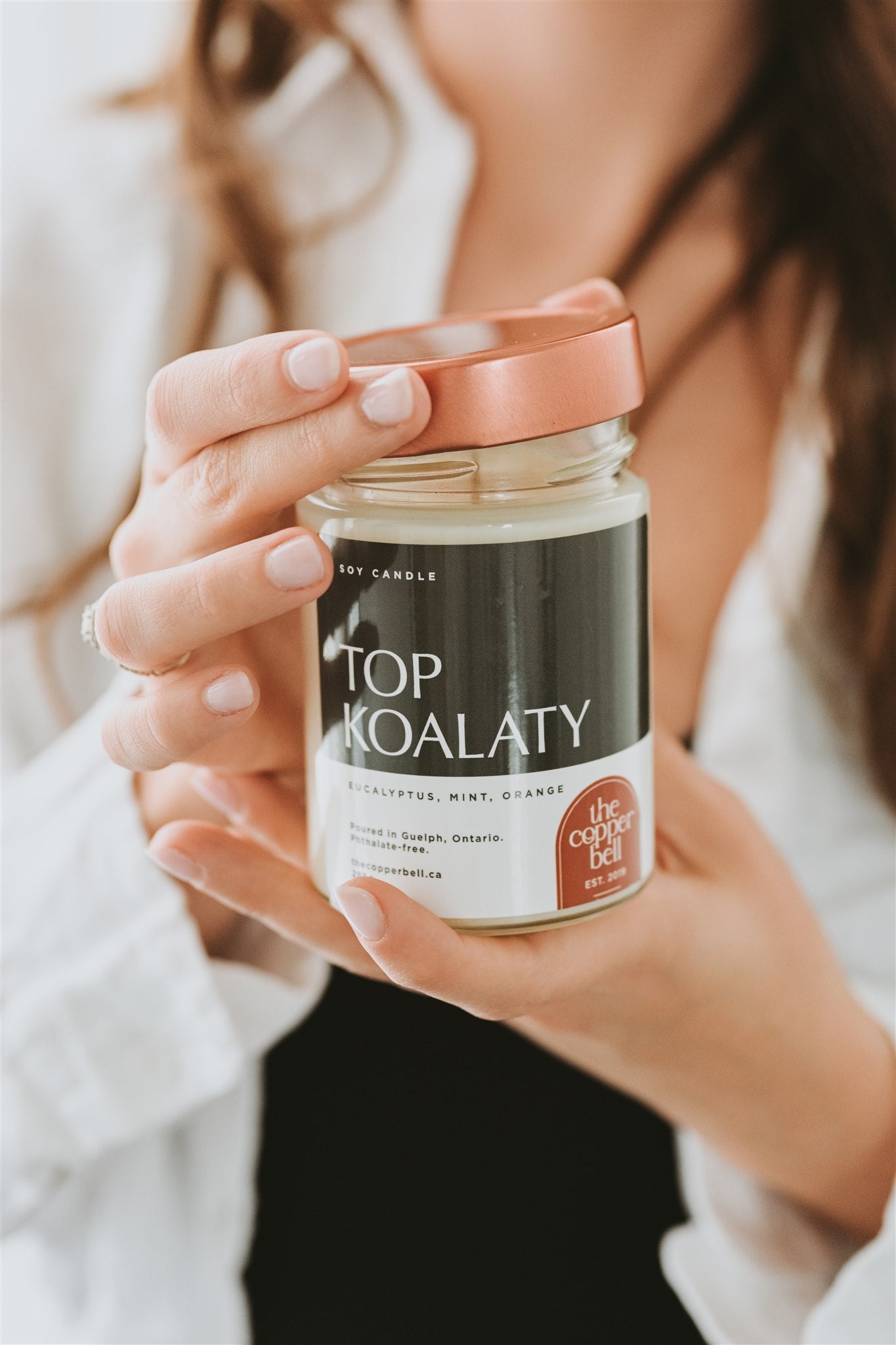 funny soy candle made by the copper bell. top koalaty smells like eucalyptus, mint, and orange