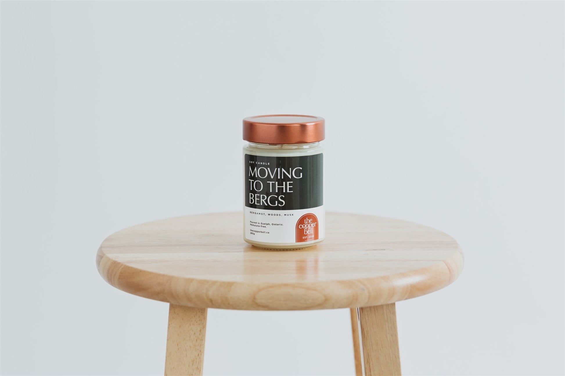 manly candle that smells like mahogany, woods, and musk