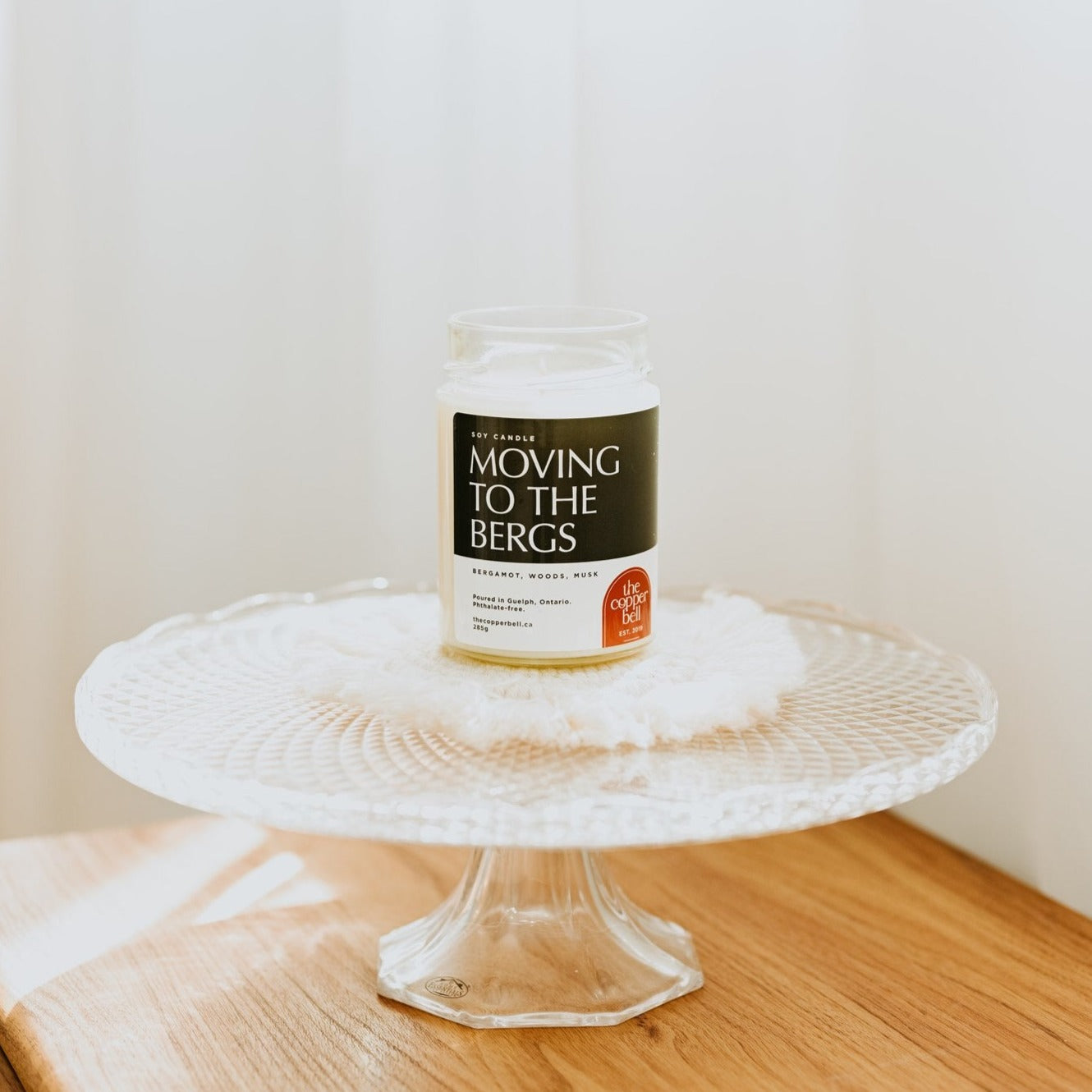 moving to the bergs candle. masculine scented candle. smells like mahogany, woods, and musk.