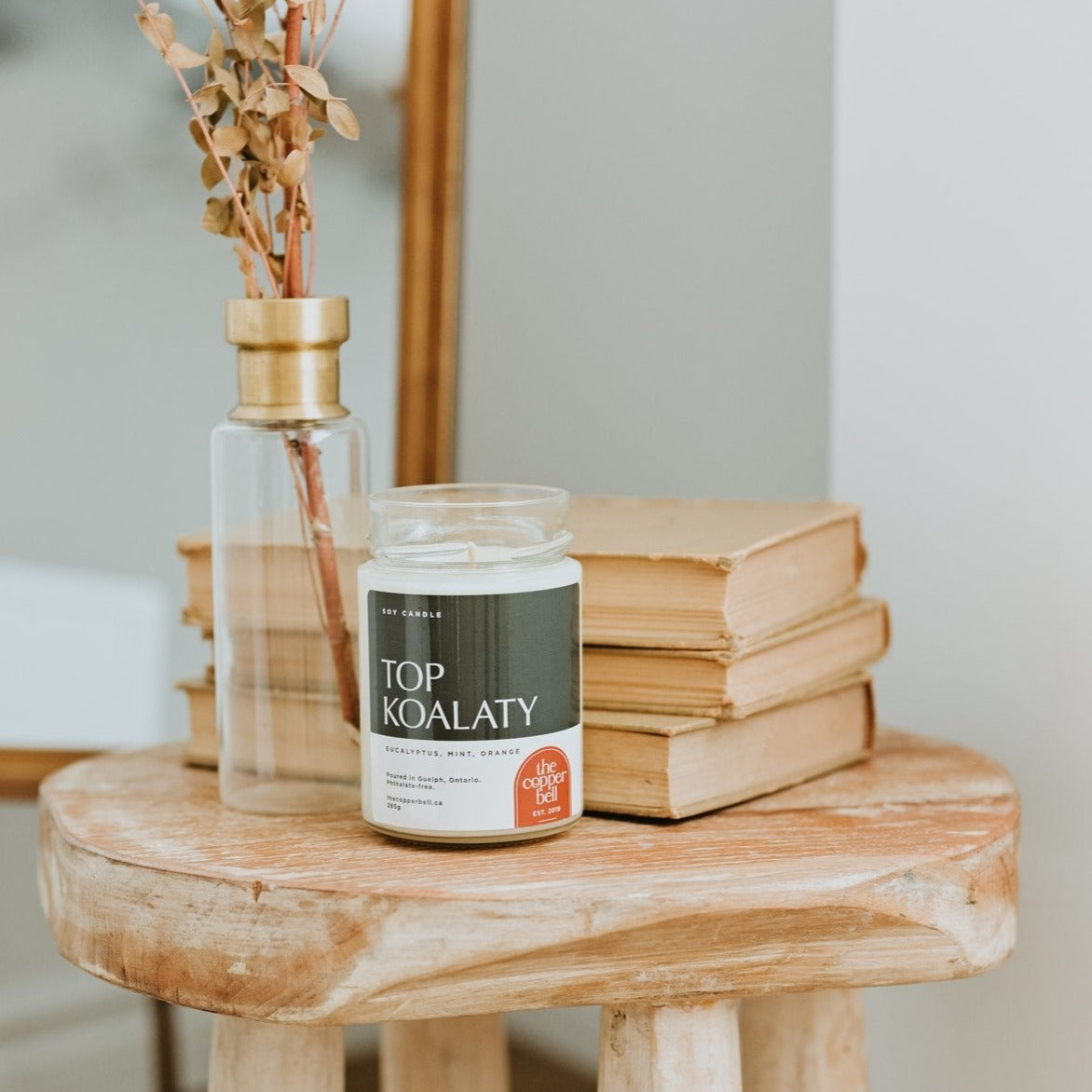 top koalaty soy candle. eucalyptus, mint, and orange scented candle.