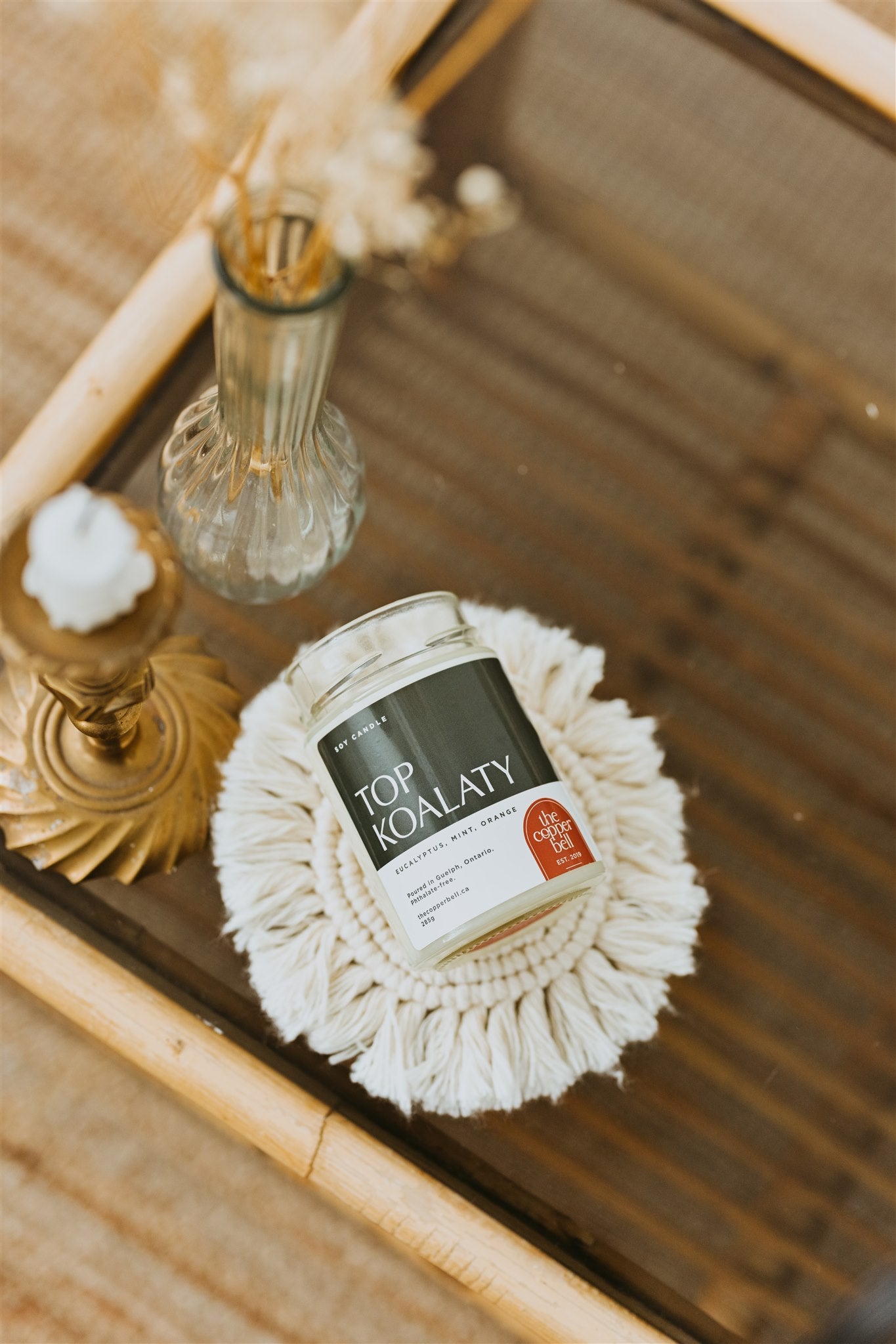 top koalaty candle. smells like a spa day at home, scented with eucalyptus, mint, and orange.